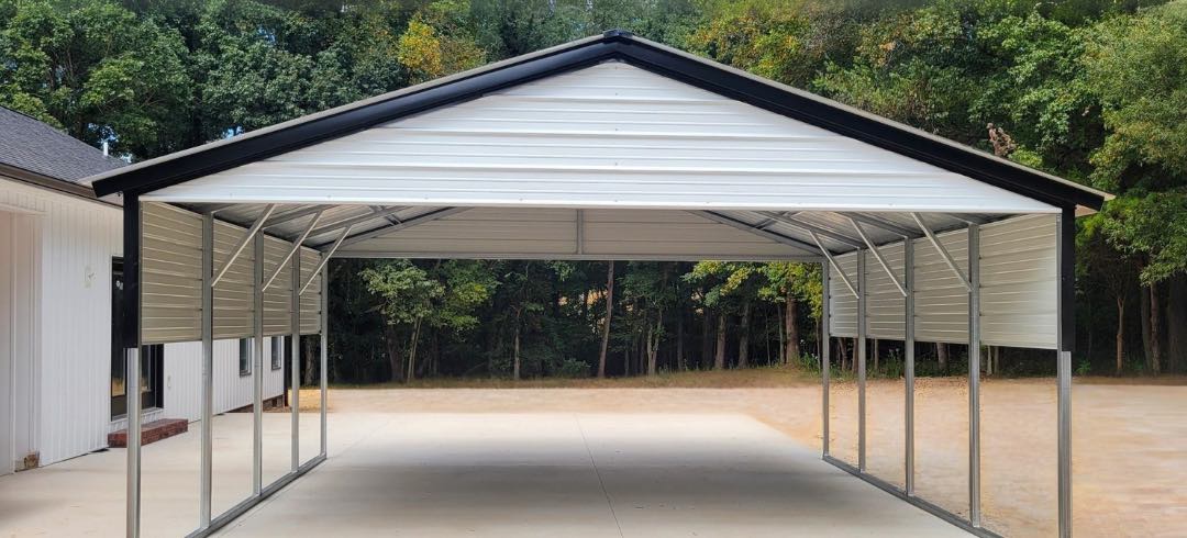Metal carport with concrete floor
